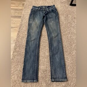 NV Low-Rise Distressed Blue Skinny Jeans